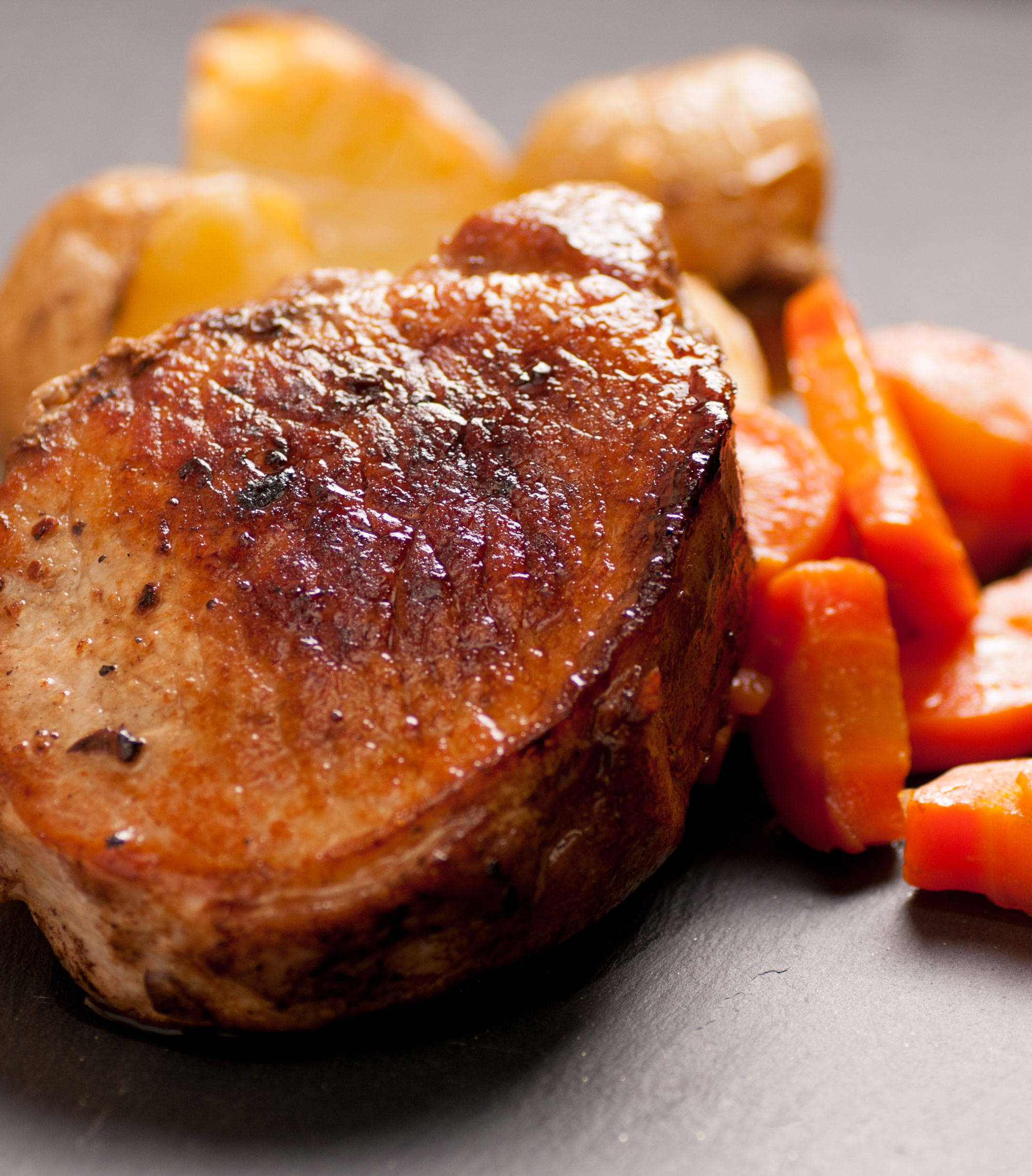 Pork chop, carrots and potatoes